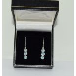 Aqua 9ct white gold drop earrings, approx. 1.20ct