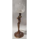 Original Art Nouveau table lamp featuring a lady complete with cut glass shade, marked "Londers"