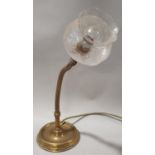 Early brass anglepoise lamp complete with glass shade.