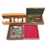 Contemporary cased brass naval tot measures together with a bar keepers friend and a cased magnifier