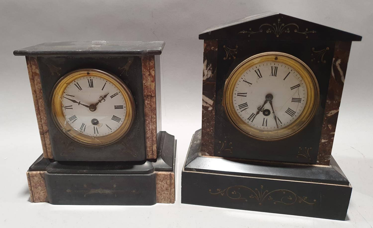 Two antique slate mantle clocks.