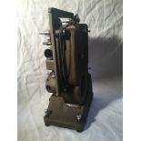 SPECTO FILM PROJECTOR. A vintage,probably 1930s Specto 500 moving film projector. Comes with brown