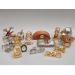 A collection of miniature clocks.