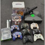 A collection of assorted gaming items to include mainly Xbox controllers, console, games and