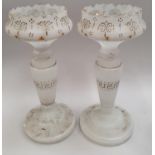 A pair of Victorian vaseline glass light lusters with gold coloured gilt decoration each 33cm tall.