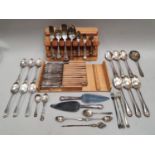 A collection of silver and silver plated flatware.