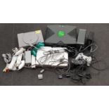 Collection of gaming consoles and accessories to include PlayStation, Xbox and Wii.