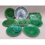 A collection of Green Wedgwood and other pottery plates with one other blue and white plate by