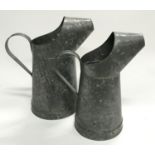 Two galvanized jugs. (ref 38)