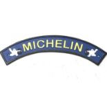A Curved Michelin sign (ref 285).