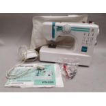 E&R Classic KPN2000 electronic sewing machine and accessories.