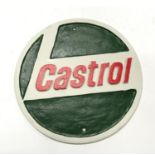 A Round Castrol sign. (ref 285)