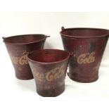 A set of three Coca Cola buckets.(ref 252)