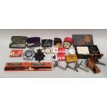 A collection of mixed curios to include vintage razors, alarm clocks, spectacles etc.