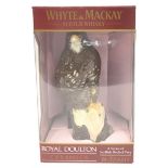 A rare Whyte and Mackay Scotch whisky decanter in the shape of a Royal Doulton ceramic Buzzard