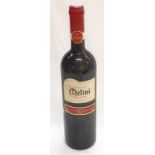 A bottle of Melini Chianti 1999 red wine.