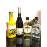 Four bottles of alcohol: Dead Mans Finger Mango Rum 70cl, Bell?s Scotch Whisky 35cl, Smirnoff