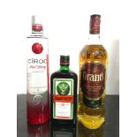 Three bottles of alcohol: Grant?s Scotch Whisky 1L, Ciroc Red Berry Vodka 70cl, Jägermeister .5L.