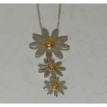 Designer Daisy gold on 925 silver pendant.