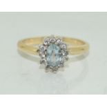 Aquamarine gold on silver cluster ring, Size Q 1/2.