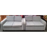 From a hotel clearance: 2 x Two seater sofa's in grey.