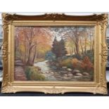 A large gilt framed oil on canvas of a river scene signed to bottom left 96x126cm.