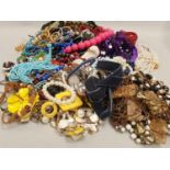 Large quantity of assorted costume jewellery.