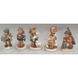 Five assorted M.J. Hummel Goebel figurines. All signed to the bases.