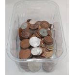 Clear plastic tub of various coinage.