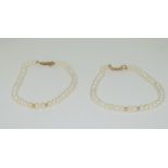 Two cultured pearl and 9ct gold bracelets, (21cms) (8 1/4")