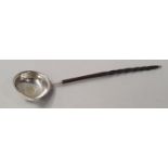 Silver hallmarked toddy ladle with whalebone handle.