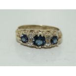 Antique blue/white three stone gold on silver ornate ring, Size K.