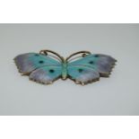 A large Art Deco silver and enamel butterfly brooch 5.7 cmx x 2.8cm, marked sterling.