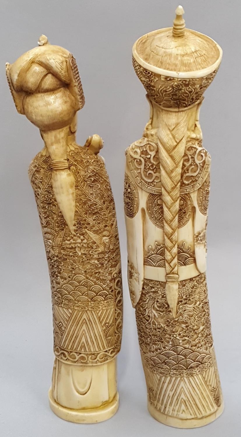 A pair of ivory coloured oriental figures 32 and 29cm high. - Image 3 of 8