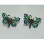 A pair of silver and plique a jour butterfly cufflinks.