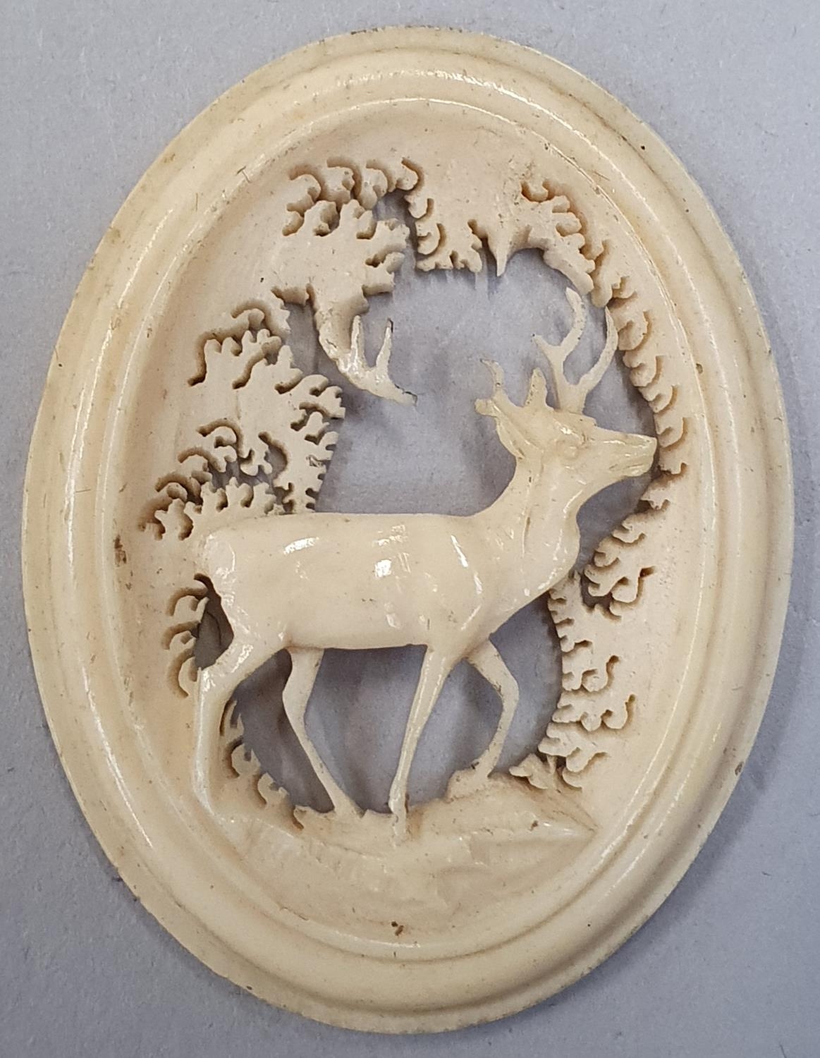 Ivory carved stag brooch