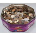 Purple tin of mixed coinage.