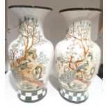 A pair of large oriental vases with tree and peacock decoration. 50cm high. Statement interior