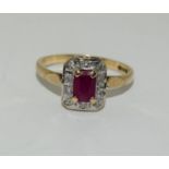 A Ruby/Diamond 9ct gold ring, Size P