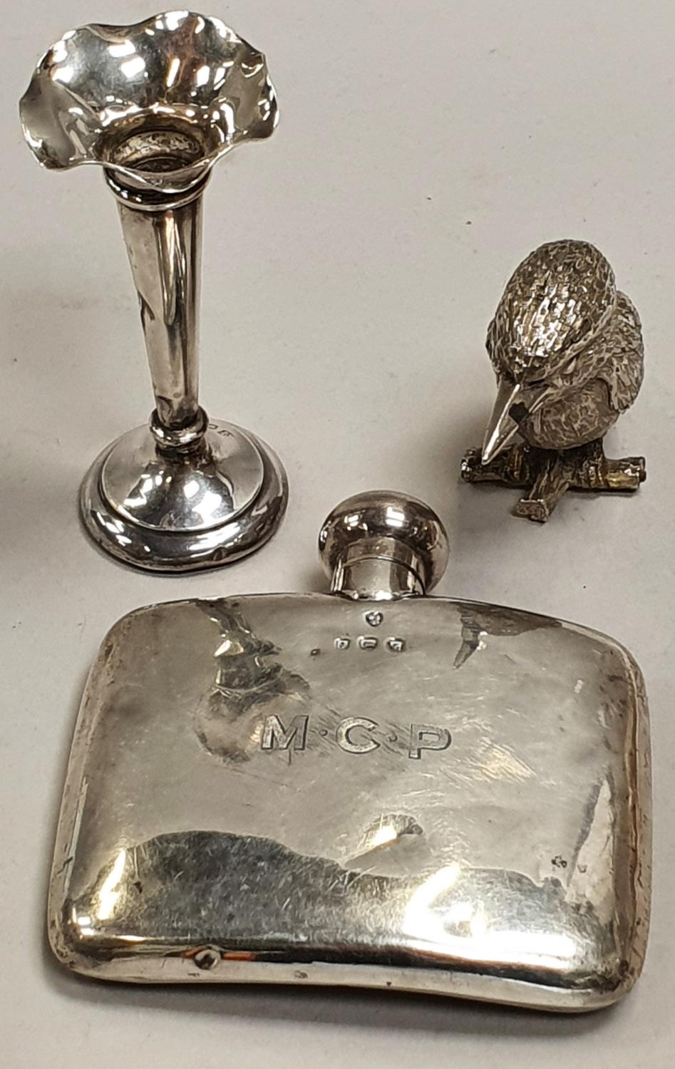 Silver plated Kookaburra ornament and two silver pieces.