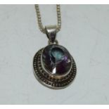 A large vintage mystic Topaz 925 silver pendant.