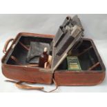 Vintage doctors leather medical bag with instruments.