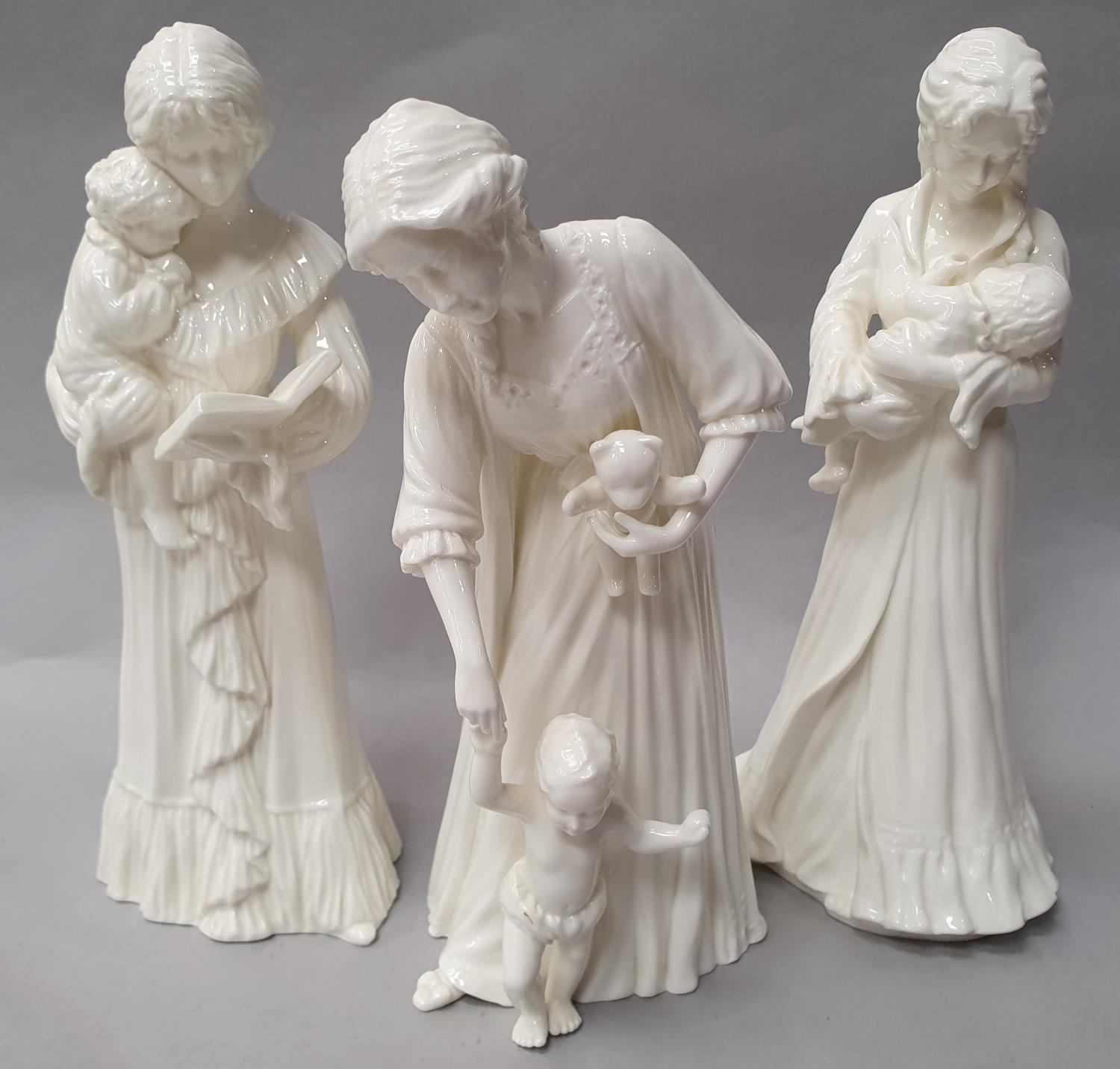 Three Royal Worcester white figurines.