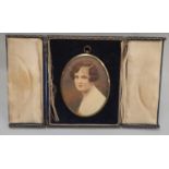 A miniature portrait of a lady in a fitted envelope shape picture frame, portrait 11x8cm