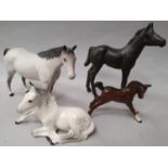 Four assorted Beswick horses.