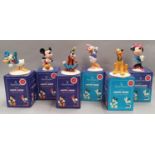 Six boxed Royal Doulton "The Mickey Mouse Collection" figures.