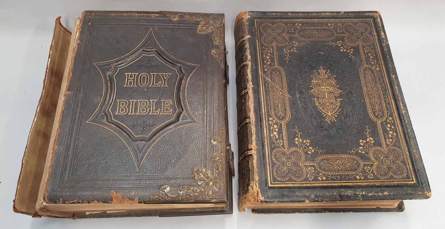 Two Victorian family bibles with illustrations.