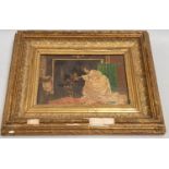 Gilt framed oil on board of a lady by a fireplace. 27.5 x 34.5cm.
