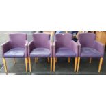 From a hotel clearance: Four purple lobby chairs.
