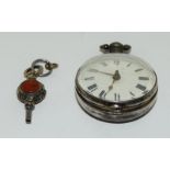 Silver pear case pocket watch without the outer case and an agate pocket watch key working
